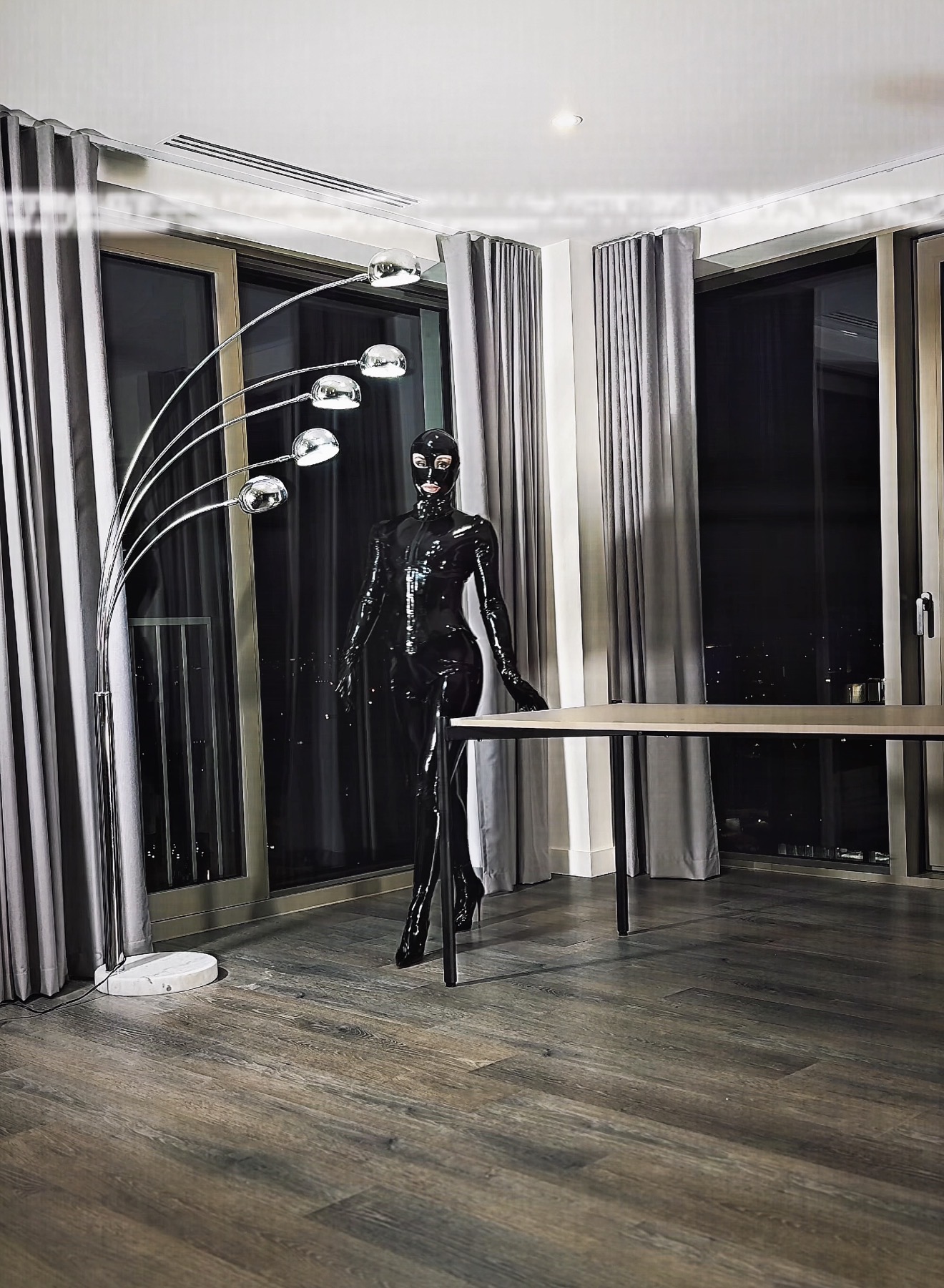 Latexdreamgirl in full black latex in a private room